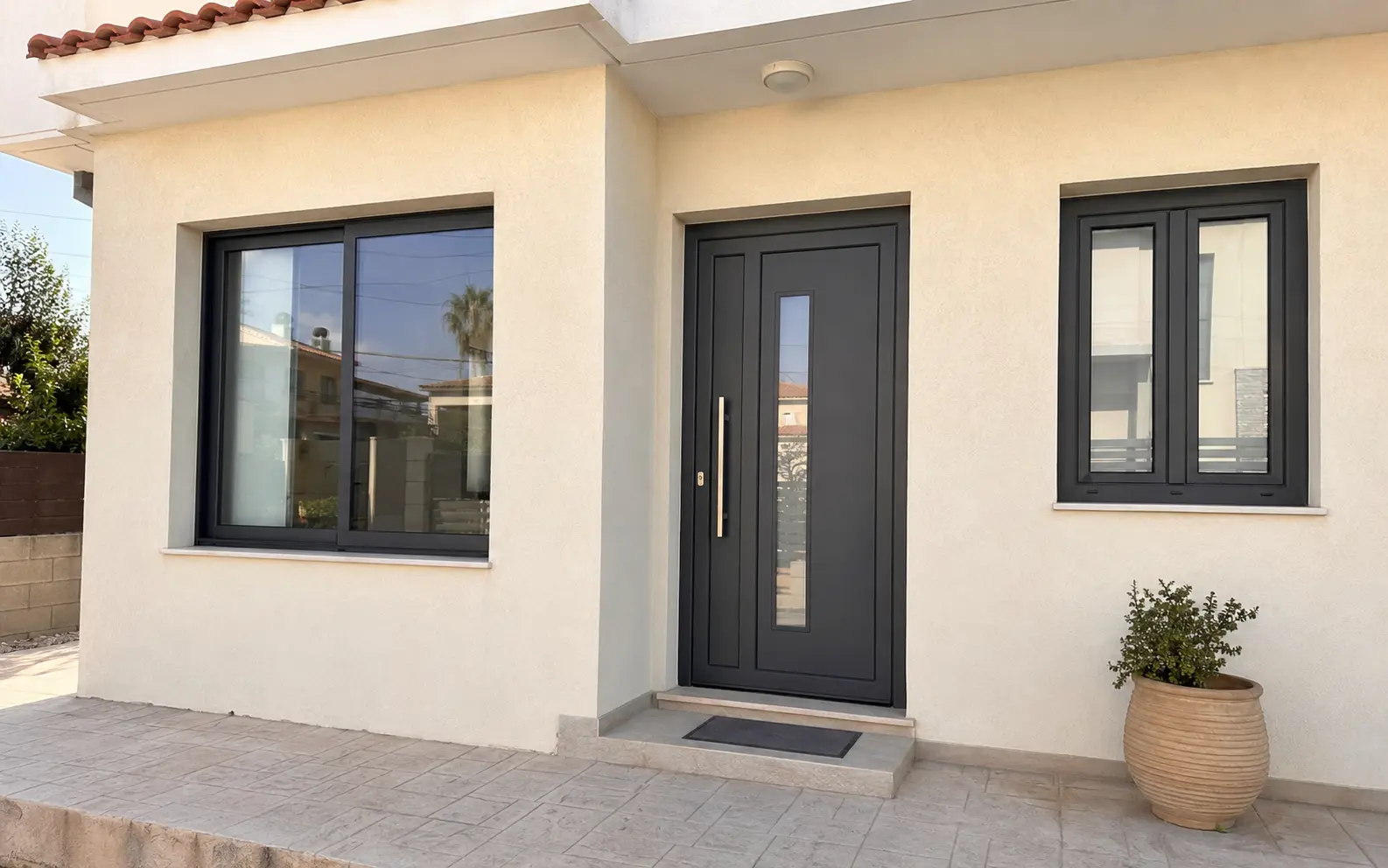 Aluminium windows and entrance door installed by Aris Metal Works