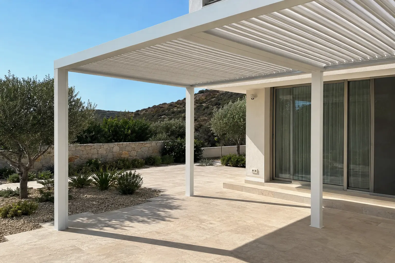 White aluminium pergola over a Mediterranean terrace