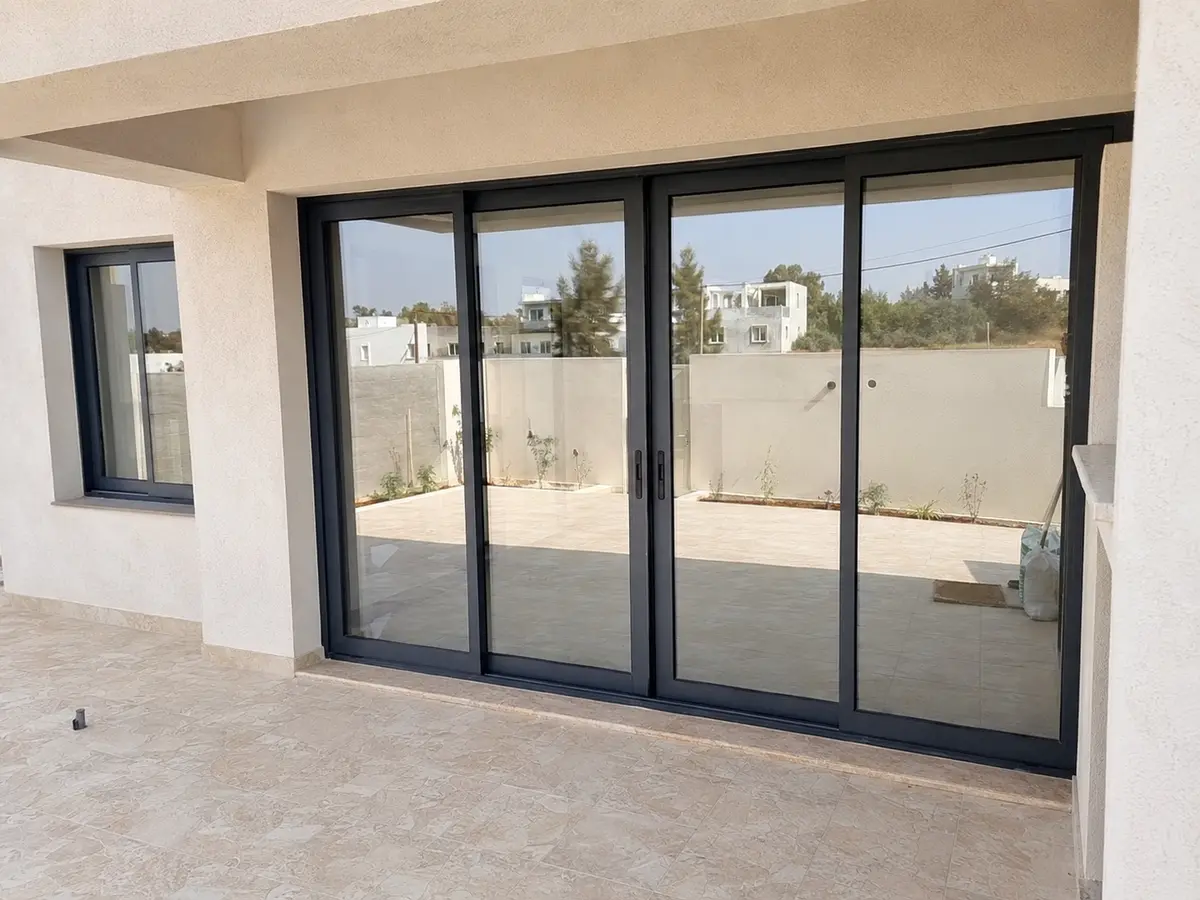 New aluminium sliding window installation at a home in Nicosia